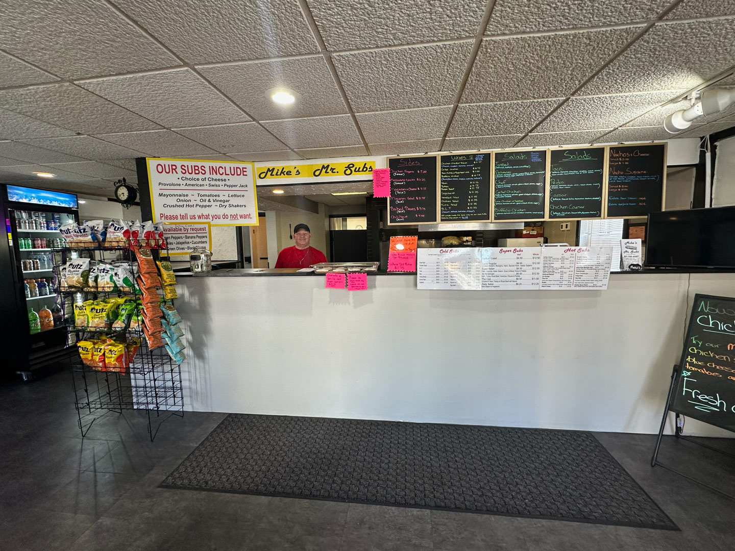 Counter and menu boards inside Mike's Mr. Subs in Dryden